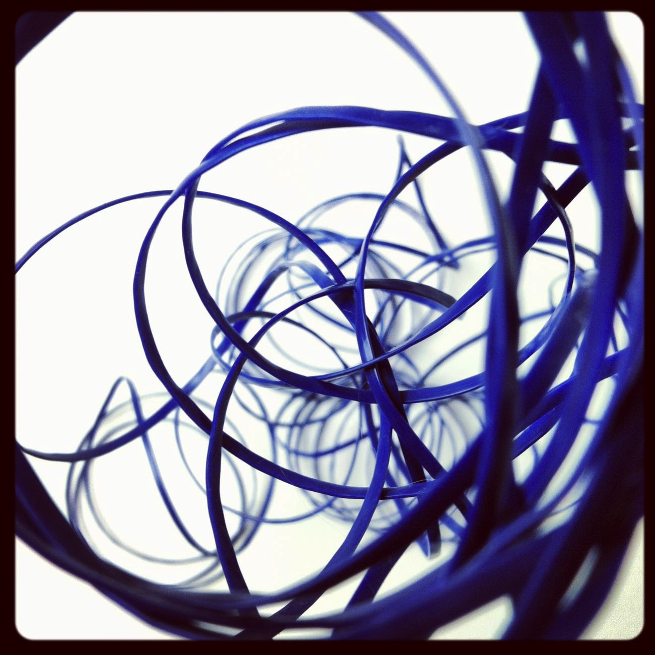 blue swirly wire or plastic