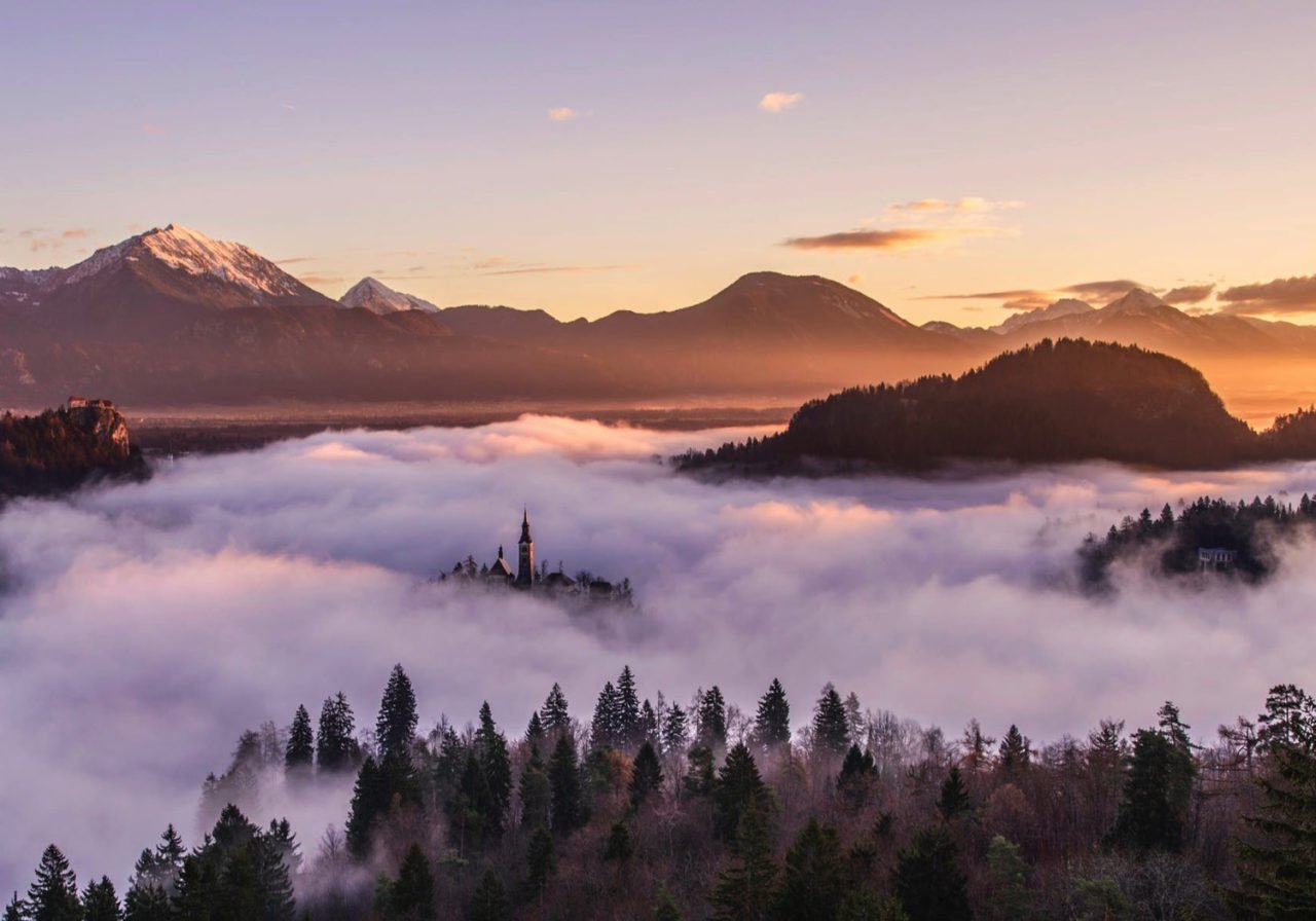 picture of valley with low lying fog