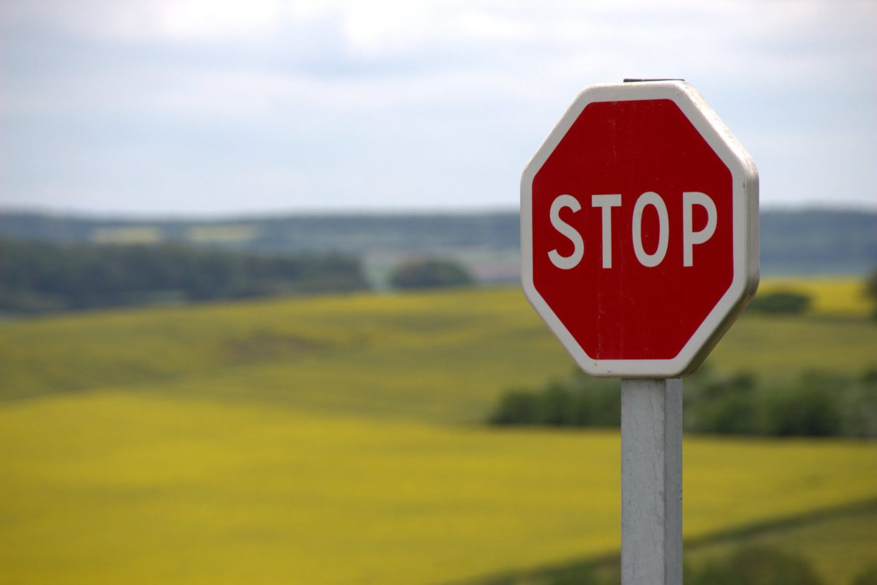 stop sign out in field